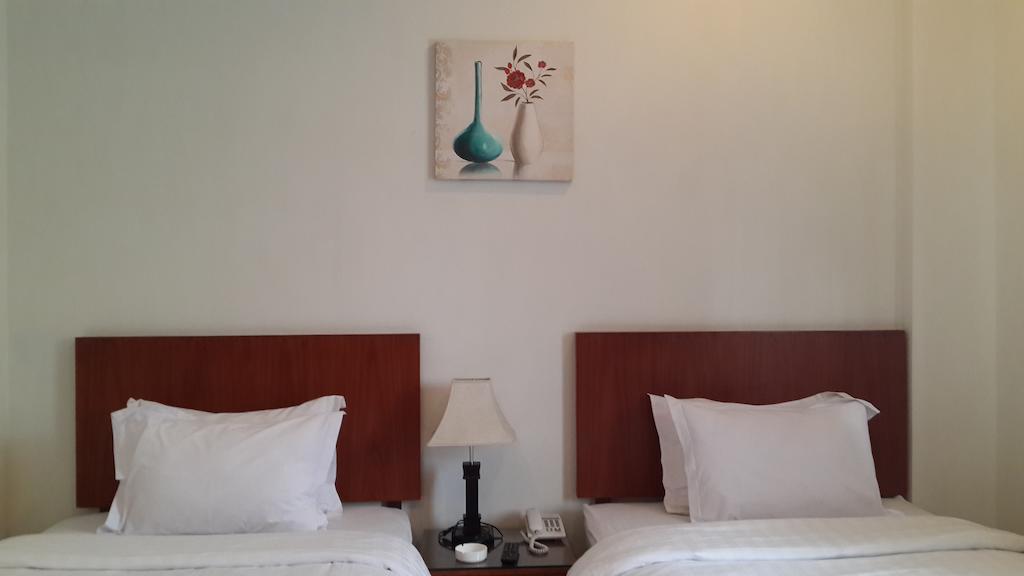 Kailani Inn Medan Habitación foto